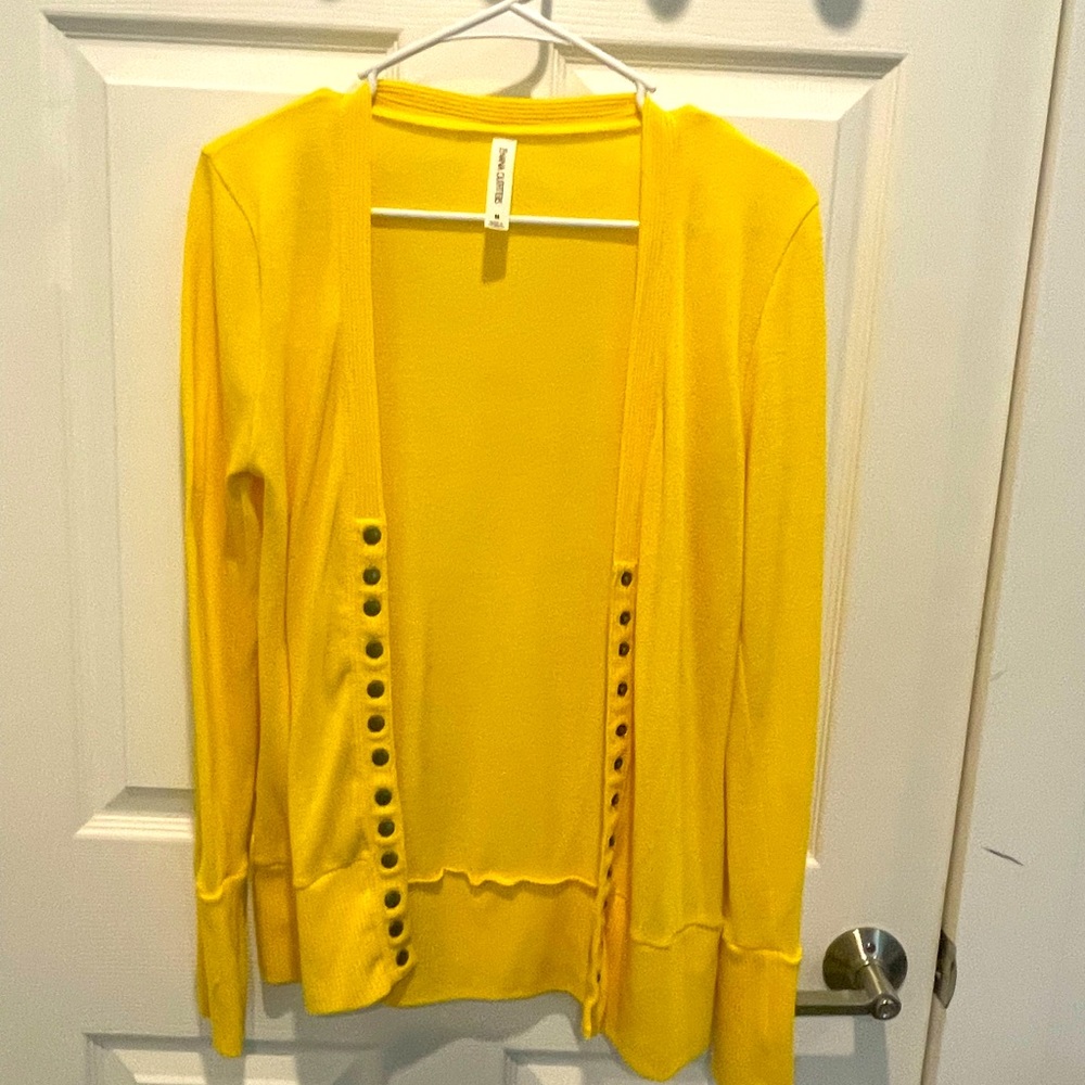 Bright yellow womens knit sweater.